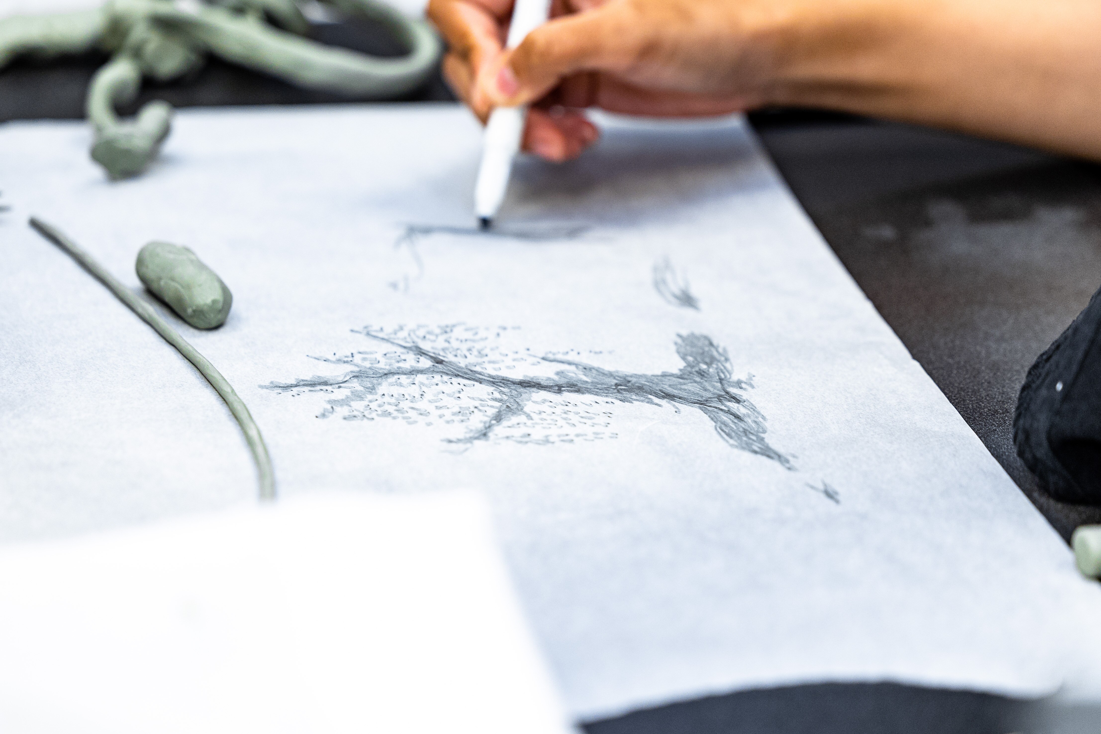 University of Memphis students collaborate on different ideas for the BlueOval City sculpture.